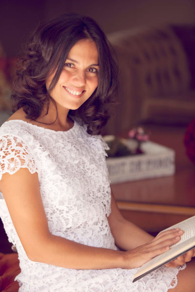 Happy Woman Reading at Home