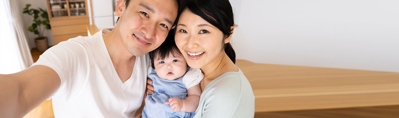 portrait of young asian family